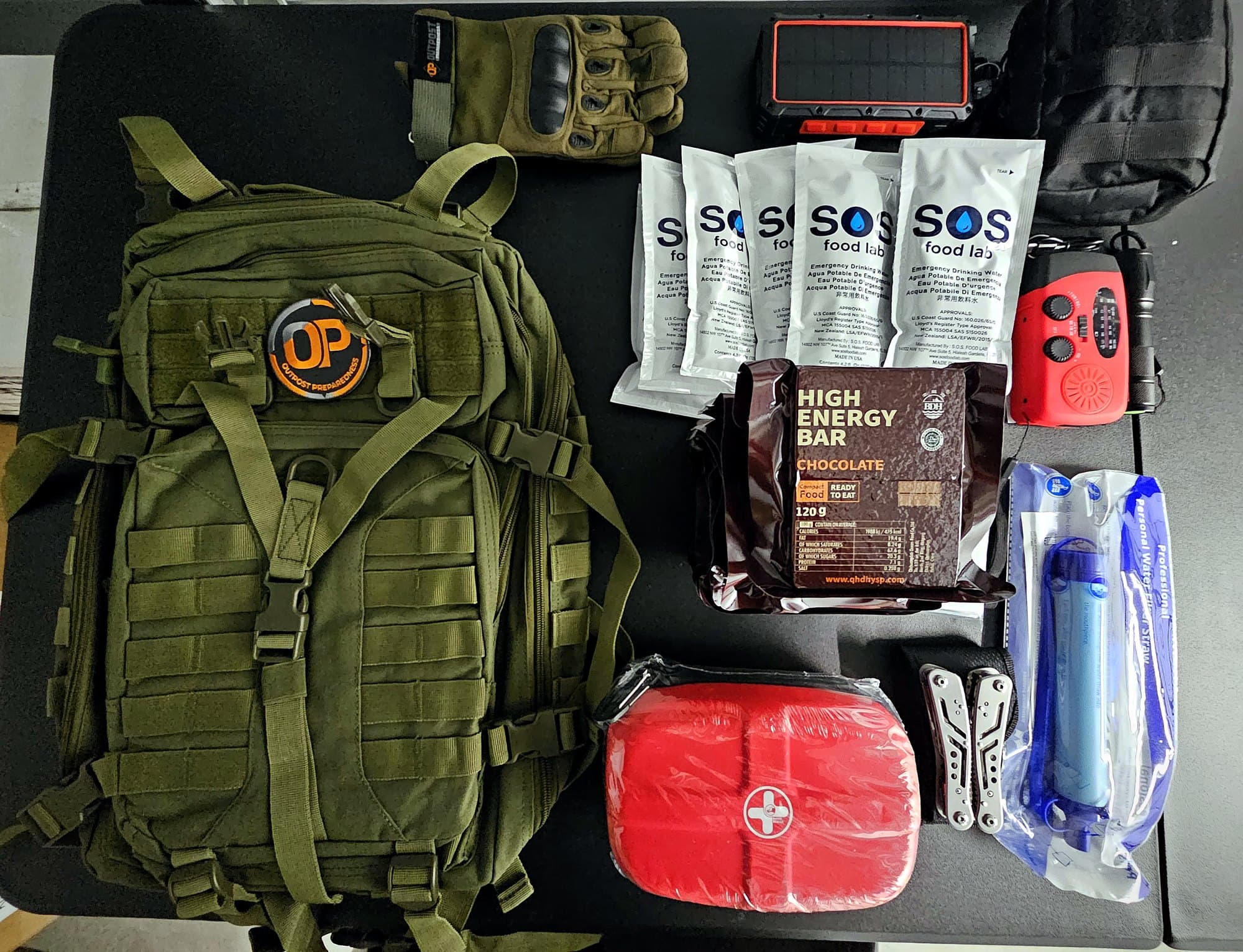 Everything inside the Essential+ Go-Bag, laid out